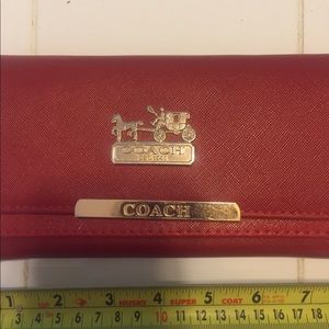 Lightly used tri-fold Coach wallet